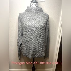 Turtle neck sweater runs small